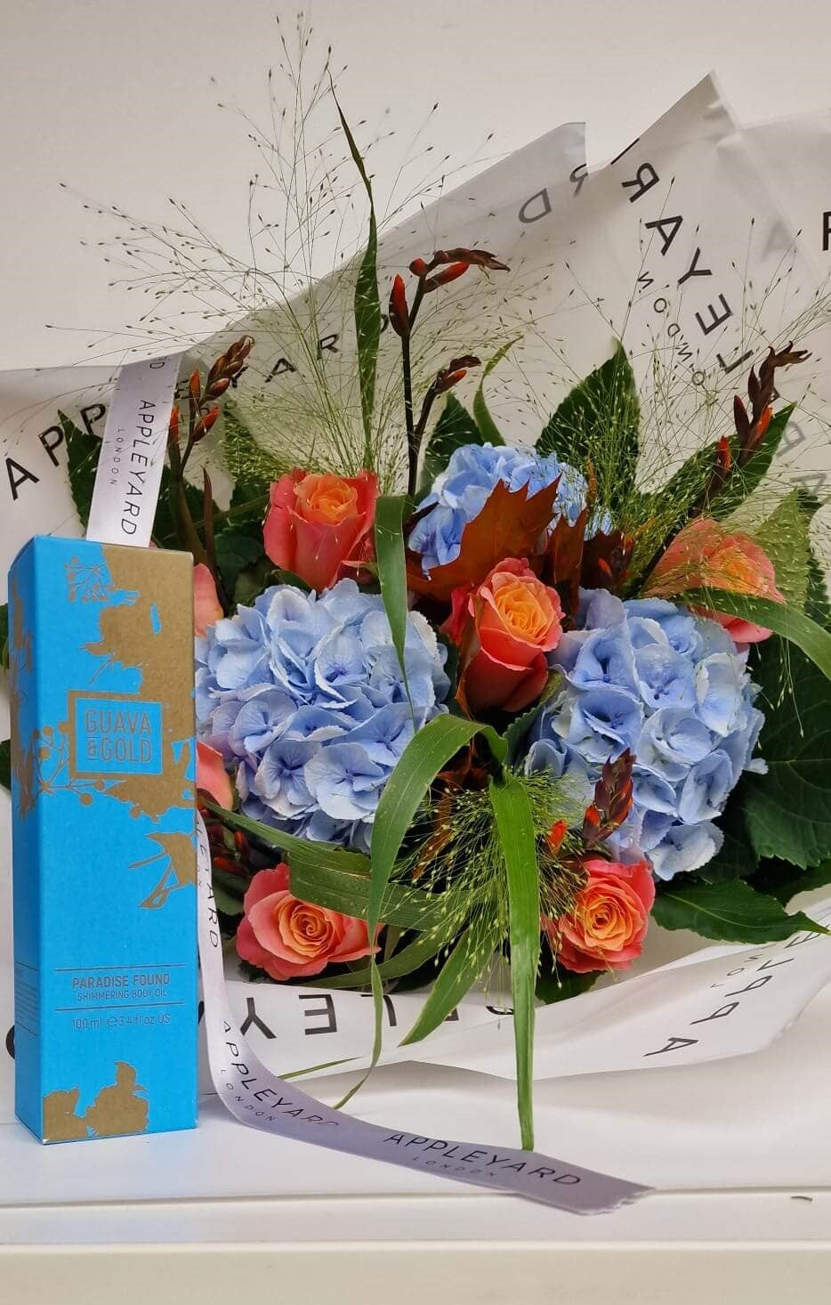 Appleyard Flowers bouquet and Guava & Gold Shimmering Body Oil