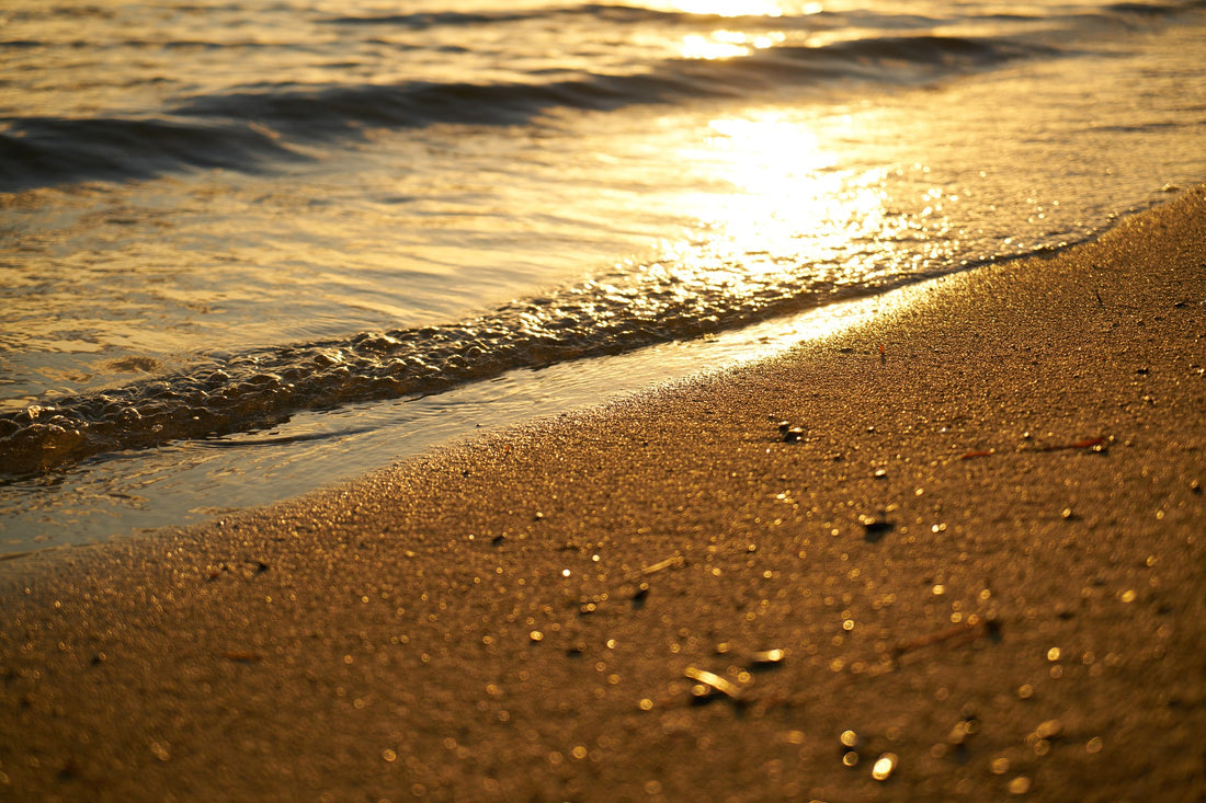 Golden sunset over sandy beach